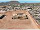 Aerial view of a home under construction on a lot, showcasing the framework and surrounding neighborhood at 33414 N 142Nd Way, Scottsdale, AZ 85262