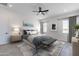 Serene bedroom with ceiling fan, natural light, and neutral décor at 33414 N 142Nd Way, Scottsdale, AZ 85262