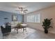 Comfortable living room with a plush couch, accent chair, and ample natural light at 3823 N 28Th St, Phoenix, AZ 85016