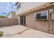 Back patio features brick walls and a secure, barred back door at 3823 N 28Th St, Phoenix, AZ 85016