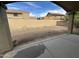 View of the backyard, framed by a covered patio looking out on blue skies at 4050 E Agave Rd, Phoenix, AZ 85044