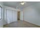 Carpeted bedroom with closet and window at 4050 E Agave Rd, Phoenix, AZ 85044