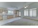 Bright kitchen with white appliances and neutral-colored cabinets at 4050 E Agave Rd, Phoenix, AZ 85044