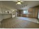 Open-concept kitchen and dining area featuring a combination of carpet and tile flooring at 4050 E Agave Rd, Phoenix, AZ 85044