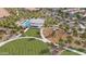 Community aerial view with a pool, clubhouse, playground, green space, and parking at 4135 E Sagebrush St, Gilbert, AZ 85296