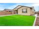 Picture of the exterior of the home, showing a covered patio and artificial turf at 4135 E Sagebrush St, Gilbert, AZ 85296