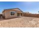 Backyard with a stucco home, cement patio, and block wall fence at 5352 W Las Palmaritas Dr, Glendale, AZ 85302