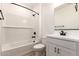 Well lit bathroom featuring white subway tile at 5352 W Las Palmaritas Dr, Glendale, AZ 85302