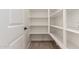 Large pantry with ample shelving space for food storage and organization at 5352 W Las Palmaritas Dr, Glendale, AZ 85302