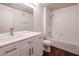 Bathroom featuring a shower-tub combo, modern vanity, beautiful fixtures and decorative hardware at 5401 E Van Buren St # 2095, Phoenix, AZ 85008