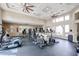 Modern fitness center with a variety of cardio equipment, weight machines, and free weights at 5401 E Van Buren St # 2095, Phoenix, AZ 85008