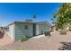 Backyard featuring landscaping, gravel, and a patio, perfect for relaxation and outdoor activities at 5402 E Mckellips Rd # 326, Mesa, AZ 85215