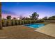 Inviting pool area with clear blue water and modern landscaping, perfect for relaxation and outdoor enjoyment at 6759 E Aire Libre Ln, Scottsdale, AZ 85254