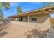 Home exterior featuring a covered patio with a concrete block barrier at 6824 N 31 Ave, Phoenix, AZ 85017