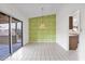 Dining area with sliding glass doors, tile flooring and view of the backyard at 6824 N 31 Ave, Phoenix, AZ 85017