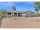 Single-story home with a two-car garage and desert landscaping at 6824 N 31 Ave, Phoenix, AZ 85017