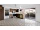 Bright kitchen featuring a vintage green dishwasher, tile floors and a sliding glass door to the yard at 6824 N 31 Ave, Phoenix, AZ 85017