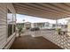 Relaxing covered patio featuring a lattice surround, offering a tranquil space to enjoy the outdoors at 7750 E Broadway Rd # 843, Mesa, AZ 85208