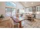 Bright, updated kitchen with white cabinetry, granite countertops, and a central island at 7826 W Kerry Ln, Glendale, AZ 85308