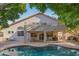 Backyard features a pool, patio, and a balcony, perfect for enjoying the Arizona weather at 7826 W Kerry Ln, Glendale, AZ 85308