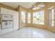 Bright breakfast nook is filled with natural light from the many windows and features tile flooring at 908 E Mountain Sage Dr, Phoenix, AZ 85048