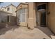 Welcoming front entry featuring a decorative window and stylish black front door at 908 E Mountain Sage Dr, Phoenix, AZ 85048