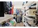 Organized walk-in closet with plenty of storage space at 913 E Tekoa Ave, Gilbert, AZ 85298