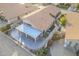 Lovely aerial view of the home with a covered patio, artificial turf, and meticulously maintained yard at 9409 W Taro Ln, Peoria, AZ 85382