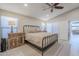 Comfortable bedroom with a modern bed frame, side tables, and carpet at 9409 W Taro Ln, Peoria, AZ 85382