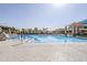 Community pool area with clear blue water on a bright day at 9409 W Taro Ln, Peoria, AZ 85382