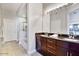 Elegant bathroom featuring double sinks, a granite countertop, and a separate shower and tub at 945 E Playa Del Norte Dr # 5023, Tempe, AZ 85288