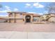 Beautiful home boasting a well-maintained exterior, three-car garage, and desert-friendly landscaping at 9686 W Keyser Dr, Peoria, AZ 85383