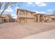 Stunning home with a three-car garage and attractive landscaping at 9686 W Keyser Dr, Peoria, AZ 85383