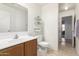 Practical bathroom featuring a vanity with storage and tile flooring at 9948 N 94Th Ave, Peoria, AZ 85345