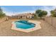 Geometric backyard pool offering a refreshing oasis and a relaxing atmosphere, surrounded by desert landscaping at 9948 N 94Th Ave, Peoria, AZ 85345