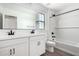 Elegant bathroom featuring double sinks, modern fixtures, and bathtub at 11605 W Green Dr, Youngtown, AZ 85363