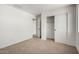 Comfortable bedroom with closet offering convenient storage solutions at 11605 W Green Dr, Youngtown, AZ 85363