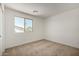 Inviting bedroom with carpet and natural light coming through the window at 11605 W Green Dr, Youngtown, AZ 85363