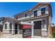 Exterior shot of a two story home with a two car garage and desert landscaping at 11605 W Green Dr, Youngtown, AZ 85363