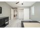 Bedroom with neutral walls, and view of hallway, closet, and black furnishings at 13346 W Jesse Red Dr, Peoria, AZ 85383