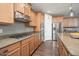 Beautiful kitchen featuring granite countertops, stainless steel appliances, and ample cabinet space at 13346 W Jesse Red Dr, Peoria, AZ 85383