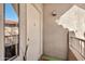 A welcoming, well-lit front door with the unit number displayed above and desert landscaping at 15380 N 100Th St # 2098, Scottsdale, AZ 85260