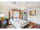 Cozy bedroom with a Murphy bed, ceiling fan and mirrored closet at 15440 E Mustang Dr, Fountain Hills, AZ 85268