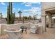 Relaxing patio area with comfortable seating and views of the desert landscape at 15440 E Mustang Dr, Fountain Hills, AZ 85268