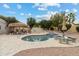 Backyard pool with seating, a tiki bar, a jacuzzi, and mature landscaping, creating a relaxing space at 15440 E Mustang Dr, Fountain Hills, AZ 85268