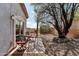 Relaxing back patio with comfortable seating and views of the serene landscaped yard at 15510 E Sycamore Dr, Fountain Hills, AZ 85268