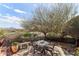 Cozy patio area with wrought iron table, seats and a view, perfect for outdoor relaxation at 15510 E Sycamore Dr, Fountain Hills, AZ 85268