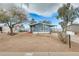 A well-kept front yard and exterior of the home is displayed at 1669 N Suncrest Ave, Casa Grande, AZ 85122