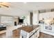 Open concept kitchen flowing into the living area, creating a great space for entertaining at 1669 N Suncrest Ave, Casa Grande, AZ 85122