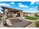 Paver patio featuring gazebo, a green lawn, and a view of the backyard and desert landscaping at 1708 W Dusty Wren Dr, Phoenix, AZ 85085